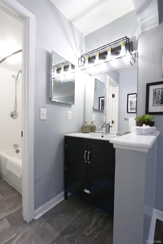 bathroom featuring vanity and shower / bathing tub combination