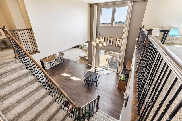 stairway featuring hardwood / wood-style flooring