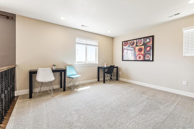 living area featuring carpet flooring