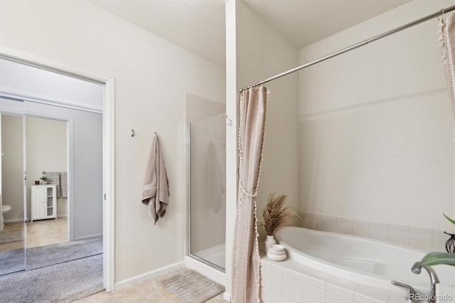 10818 Cimarron St Unit 1102, Firestone, CO 80504 - full bath with a garden tub and a tile shower