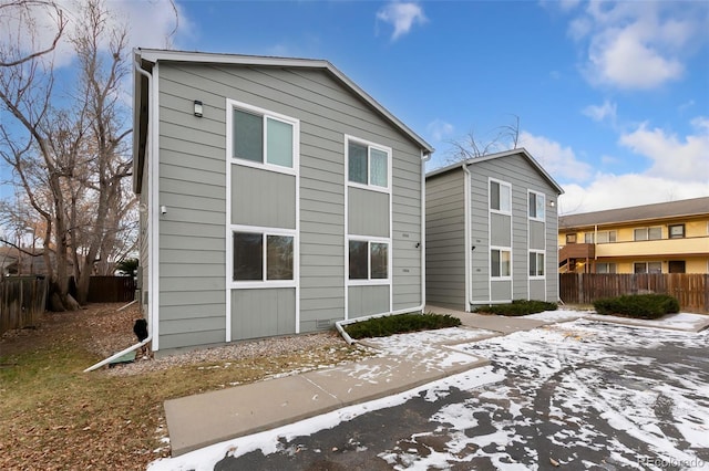 1502 E 5th St, Loveland, CO 80537 - snow covered rear of property with fence