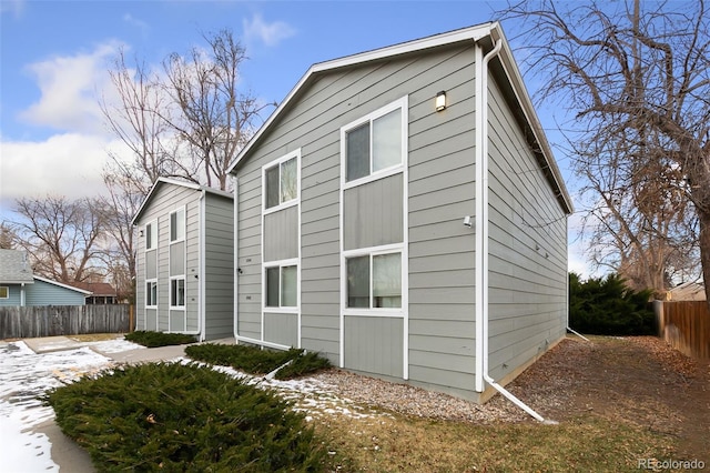 1502 E 5th St, Loveland, CO 80537 - rear view of house featuring fence