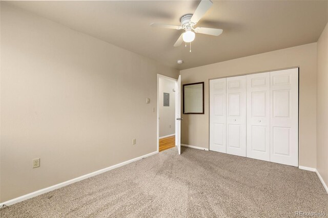 1502 E 5th St, Loveland, CO 80537 - unfurnished bedroom featuring ceiling fan, carpet floors, a closet, and baseboards