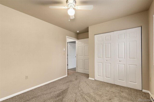 1502 E 5th St, Loveland, CO 80537 - unfurnished bedroom featuring ceiling fan, baseboards, a closet, and carpet