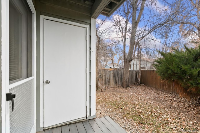 wooden deck featuring fence