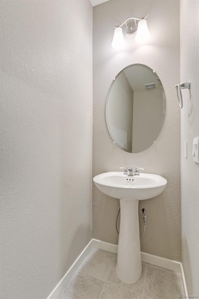 bathroom with tile patterned flooring