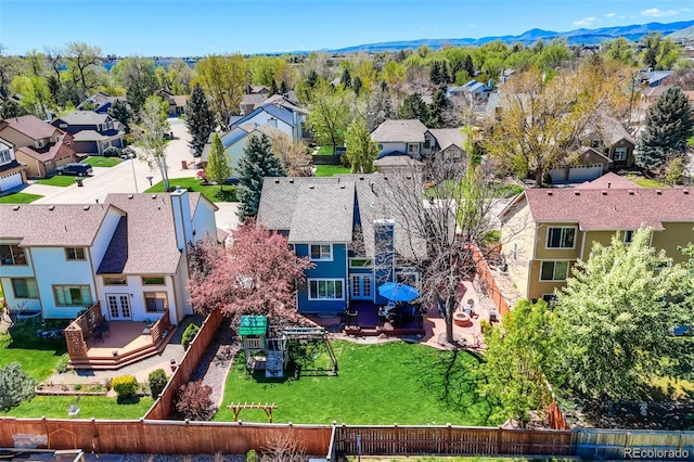 14533 W 69th Pl, Arvada, CO 80004 - aerial view of residential area featuring a mountain backdrop