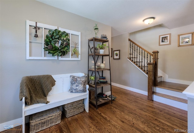 14533 W 69th Pl, Arvada, CO 80004 - sitting room with wood finished floors, stairway, and baseboards