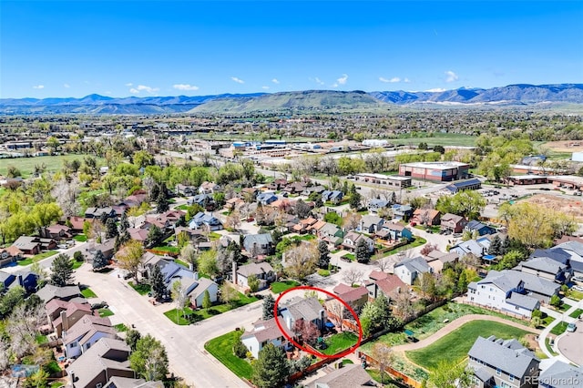 14533 W 69th Pl, Arvada, CO 80004 - aerial view of residential area with a mountain backdrop