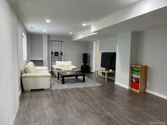 living room featuring dark hardwood / wood-style flooring