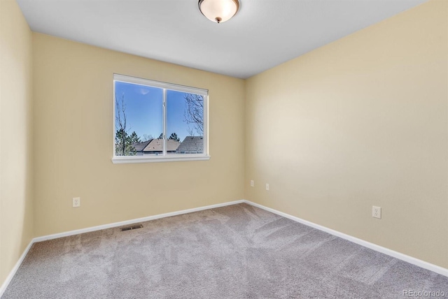 view of carpeted spare room