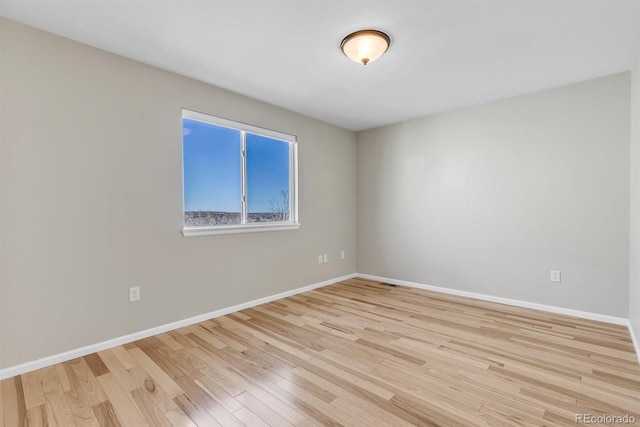 empty room featuring light hardwood / wood-style flooring