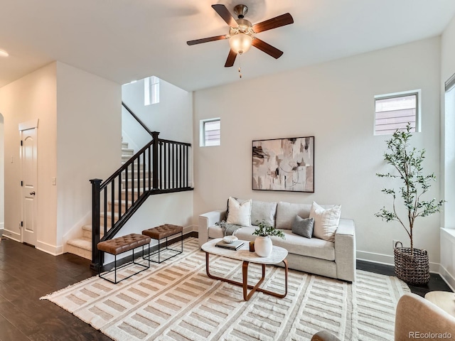 10479 E 25th Dr, Aurora, CO 80010 - living room with wood finished floors, stairway, and ceiling fan
