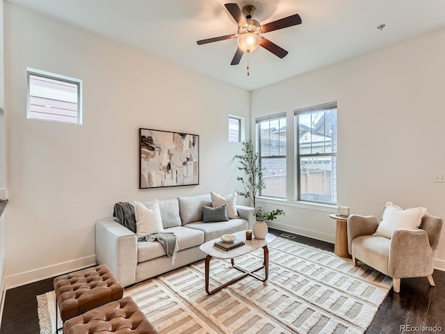 10479 E 25th Dr, Aurora, CO 80010 - living area with wood finished floors and a ceiling fan
