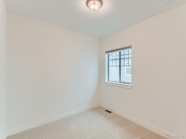 10479 E 25th Dr, Aurora, CO 80010 - empty room with baseboards and light colored carpet
