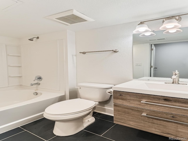 10479 E 25th Dr, Aurora, CO 80010 - bathroom featuring tile patterned floors, vanity, and washtub / shower combination