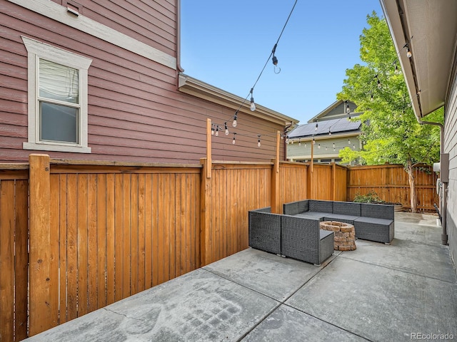 10479 E 25th Dr, Aurora, CO 80010 - fenced backyard with an outdoor living space with a fire pit and a patio