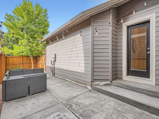 10479 E 25th Dr, Aurora, CO 80010 - fenced backyard featuring a patio and an outdoor living space