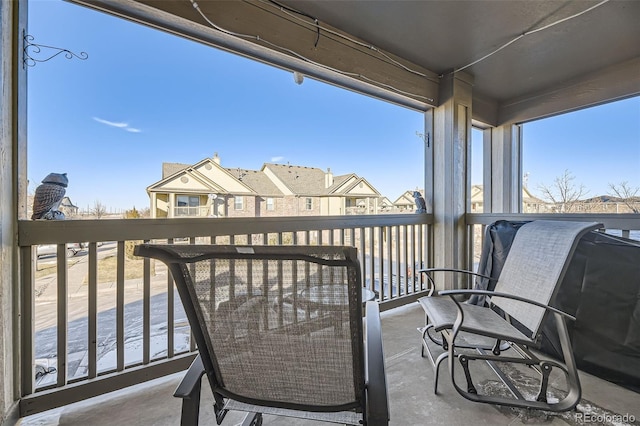 balcony featuring a residential view