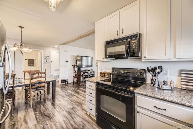 kitchen featuring black appliances, dark wood-style flooring, decorative light fixtures, and white cabinets