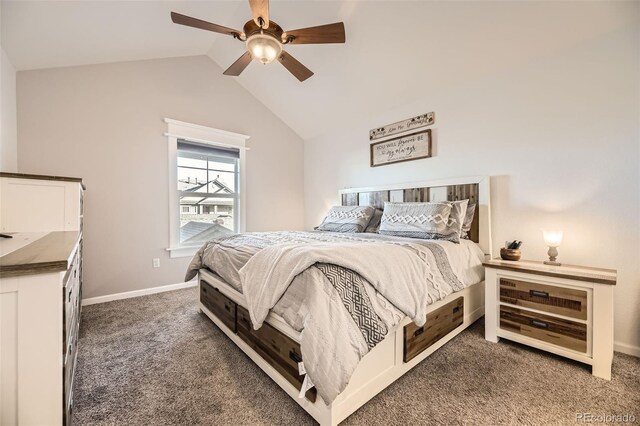 bedroom with lofted ceiling, dark colored carpet, a ceiling fan, and baseboards