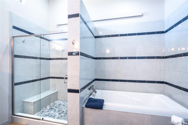 11865 Rangeview Cir, Salida, CO 81201 - full bathroom featuring a bath and a shower stall