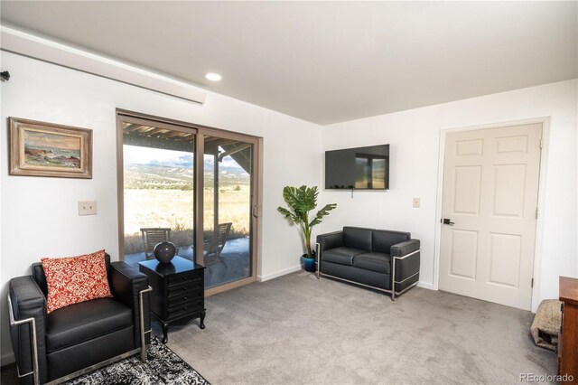 11865 Rangeview Cir, Salida, CO 81201 - living area featuring light carpet, baseboards, and recessed lighting