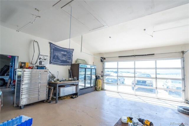 11865 Rangeview Cir, Salida, CO 81201 - living room with attic access, concrete flooring, and a garage