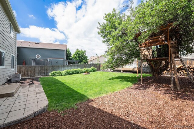 5573 S Taft St, Littleton, CO 80127 - view of yard featuring a patio