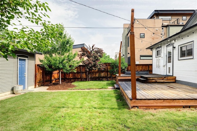 4421 Raleigh St, Denver, CO 80212 - fenced backyard featuring a wooden deck