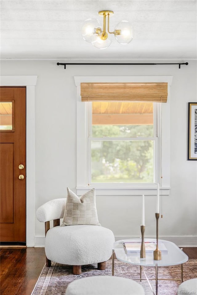 4421 Raleigh St, Denver, CO 80212 - sitting room with dark wood-style flooring and baseboards