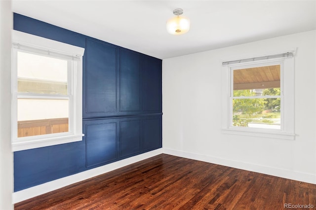 4421 Raleigh St, Denver, CO 80212 - empty room with dark wood finished floors and baseboards