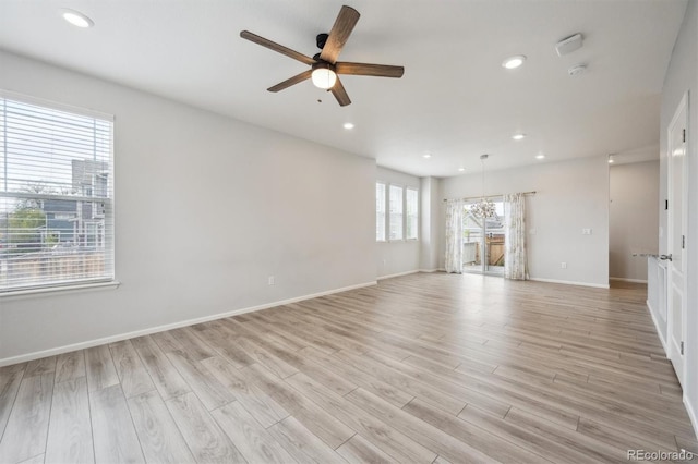3831 E 141st Ave, Thornton, CO 80602 - unfurnished living room featuring ceiling fan, light wood finished floors, recessed lighting, and baseboards