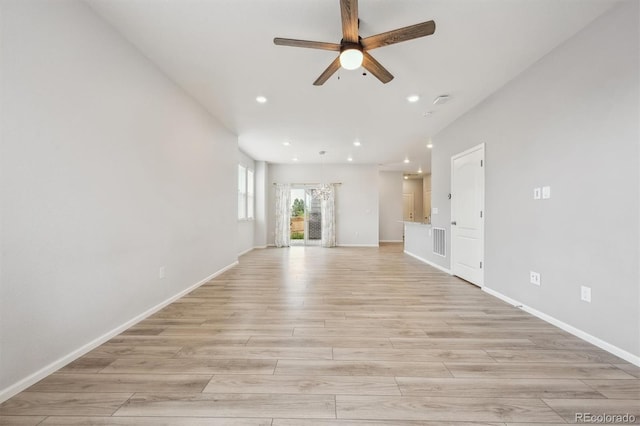 3831 E 141st Ave, Thornton, CO 80602 - unfurnished living room featuring a ceiling fan, light wood finished floors, recessed lighting, and baseboards