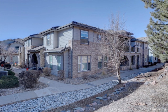 exterior space featuring central AC unit