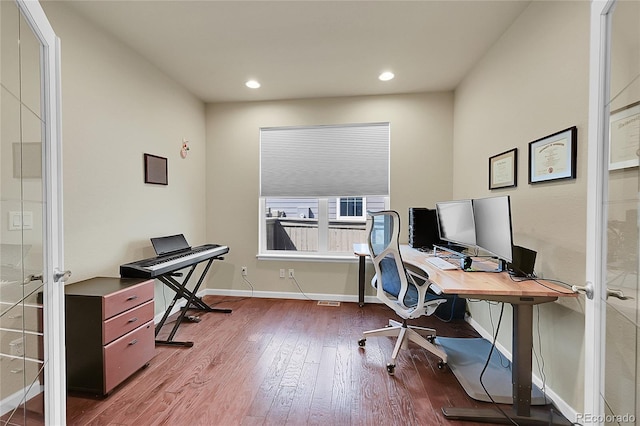 office space with french doors and wood-type flooring