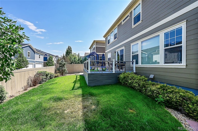 view of yard featuring a deck