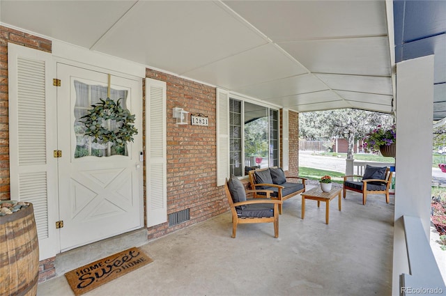view of patio with visible vents and a porch