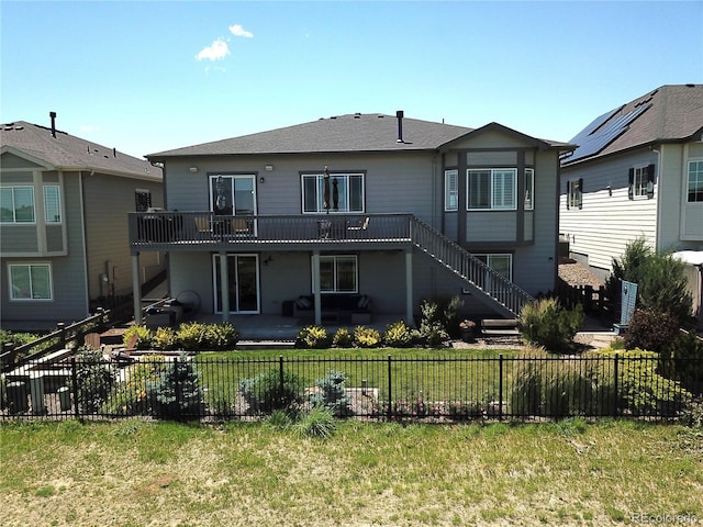 26741 E Peakview Pl, Aurora, CO 80016 - rear view of property with stairs, a fenced backyard, and a wooden deck