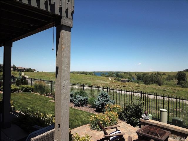 26741 E Peakview Pl, Aurora, CO 80016 - fenced backyard with a patio area and a view of rural / pastoral area