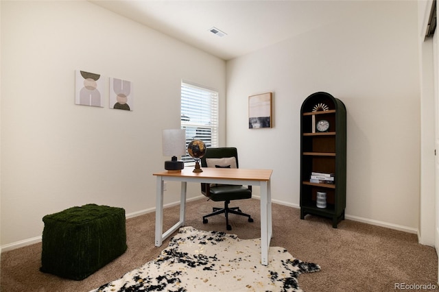 office with light carpet, visible vents, and baseboards