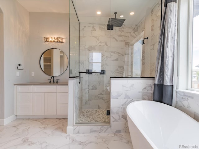 bathroom featuring a marble finish shower, vanity, a freestanding bath, recessed lighting, and marble finish flooring
