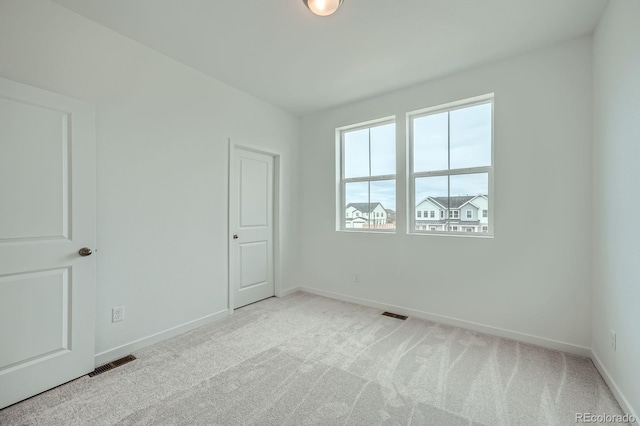 700 N Bently St, Watkins, CO 80137 - unfurnished bedroom featuring light carpet and baseboards