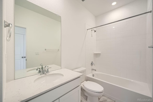 700 N Bently St, Watkins, CO 80137 - bathroom featuring toilet, vanity, and washtub / shower combination