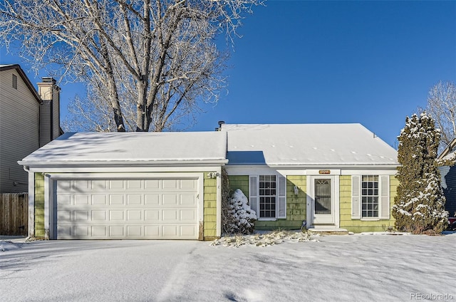 view of front of property featuring a garage