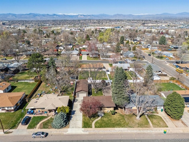 birds eye view of property featuring a mountain view and a residential view