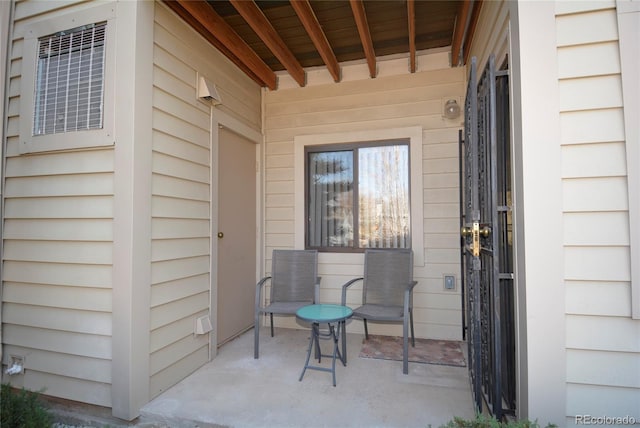 entrance to property featuring a porch