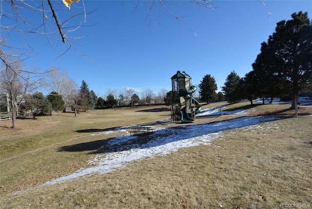 surrounding community featuring playground community and a yard