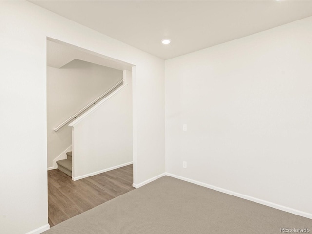 spare room featuring hardwood / wood-style floors