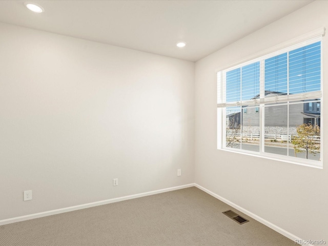 view of carpeted spare room